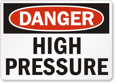 Kuvituskuva: Danger - high pressure -kyltti